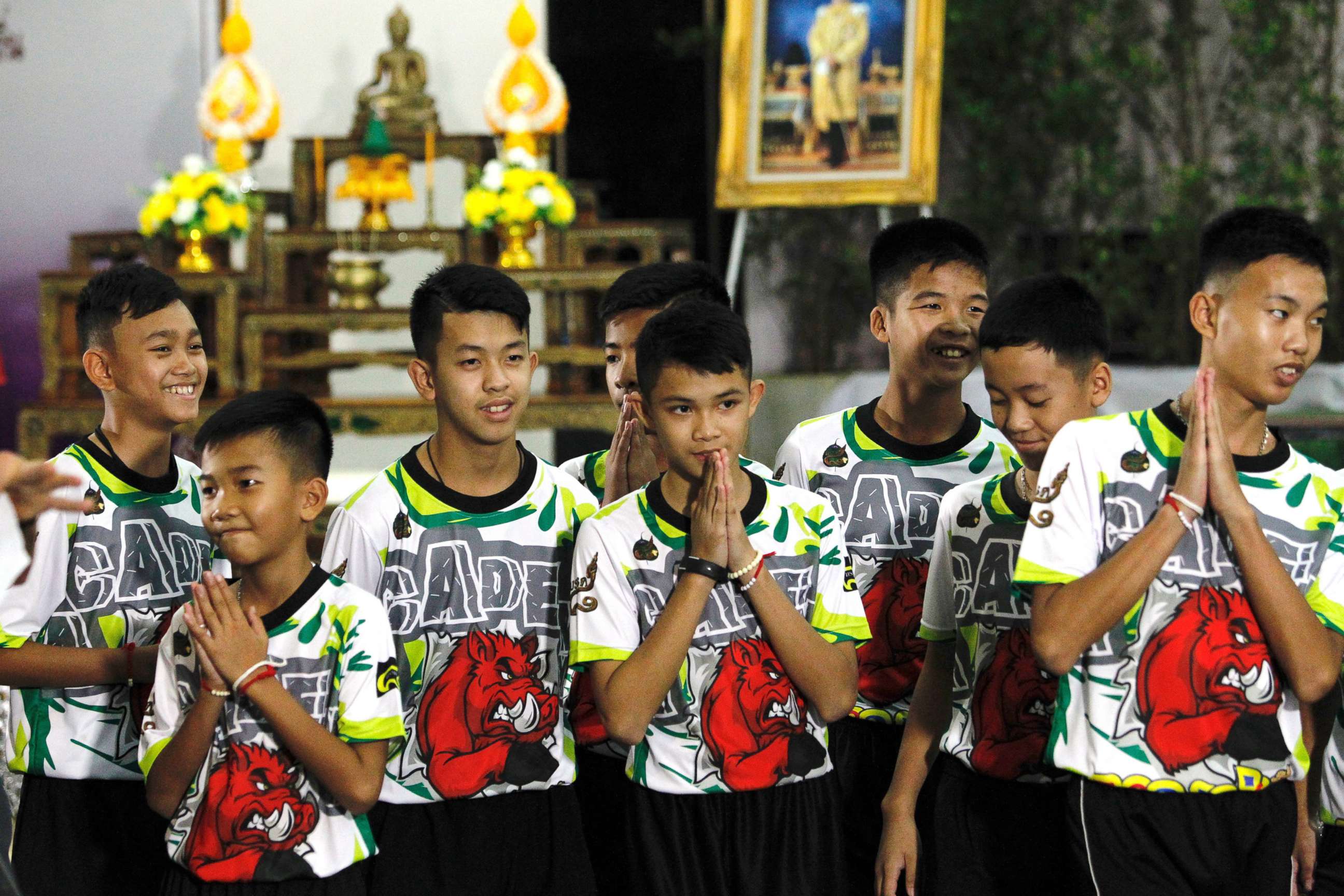 PHOTO: Some of the 12 members of the Wild Boar soccer team, who were rescued from the Tham Luang cave, greet the media at Chiang Rai Provincial Administrative Organization in Chiang Rai province, Thailand, July 18, 2018.