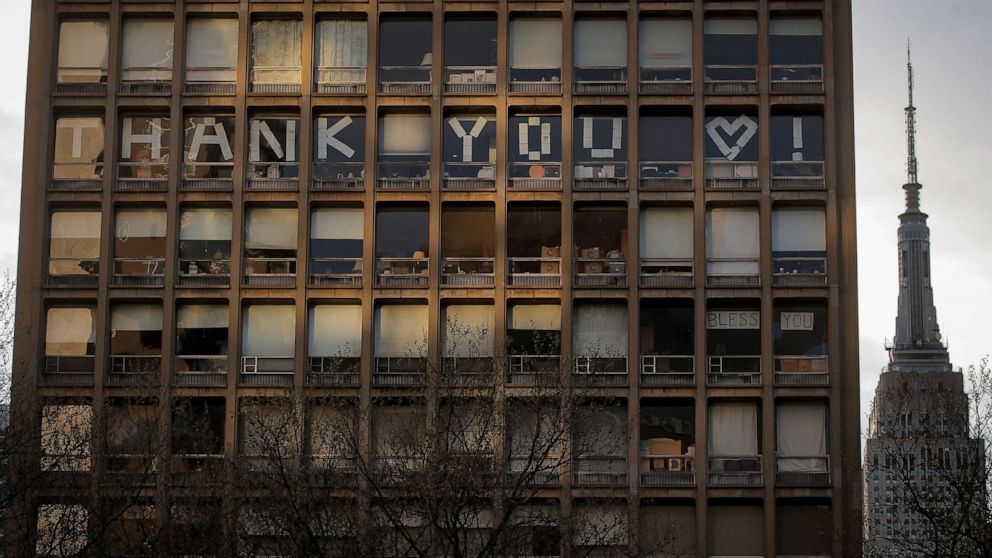 PHOTO: A sign on a building across from NYU Langone Medical Center in Manhattan, says 'THANK YOU' to healthcare workers, during the outbreak of the coronavirus disease (COVID-19) in New York City, April 20, 2020.