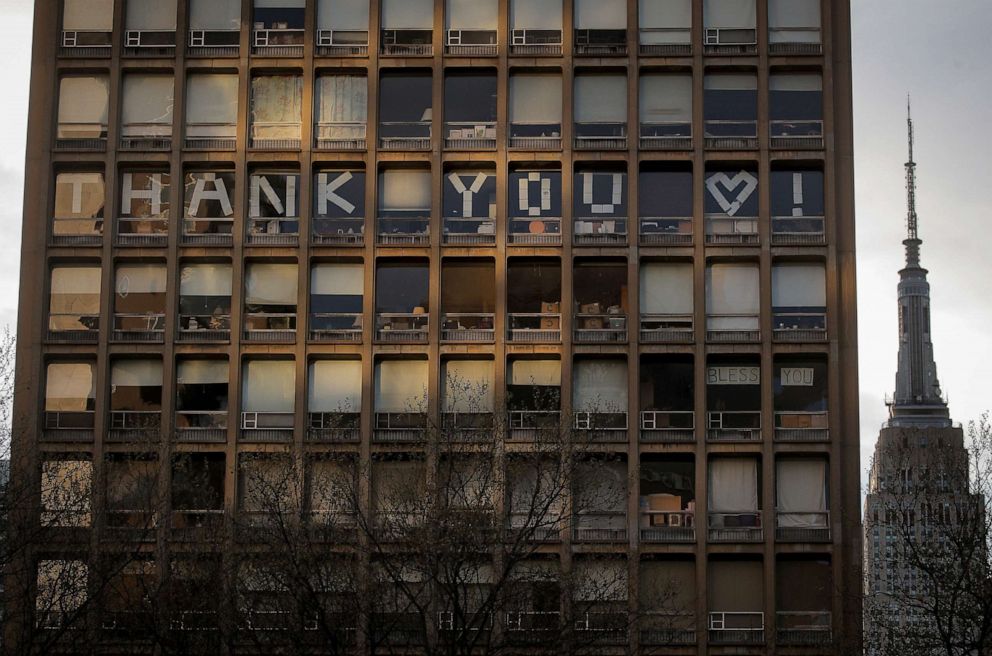 PHOTO: A sign on a building across from NYU Langone Medical Center in Manhattan, says 'THANK YOU' to healthcare workers, during the outbreak of the coronavirus disease (COVID-19) in New York City, April 20, 2020.