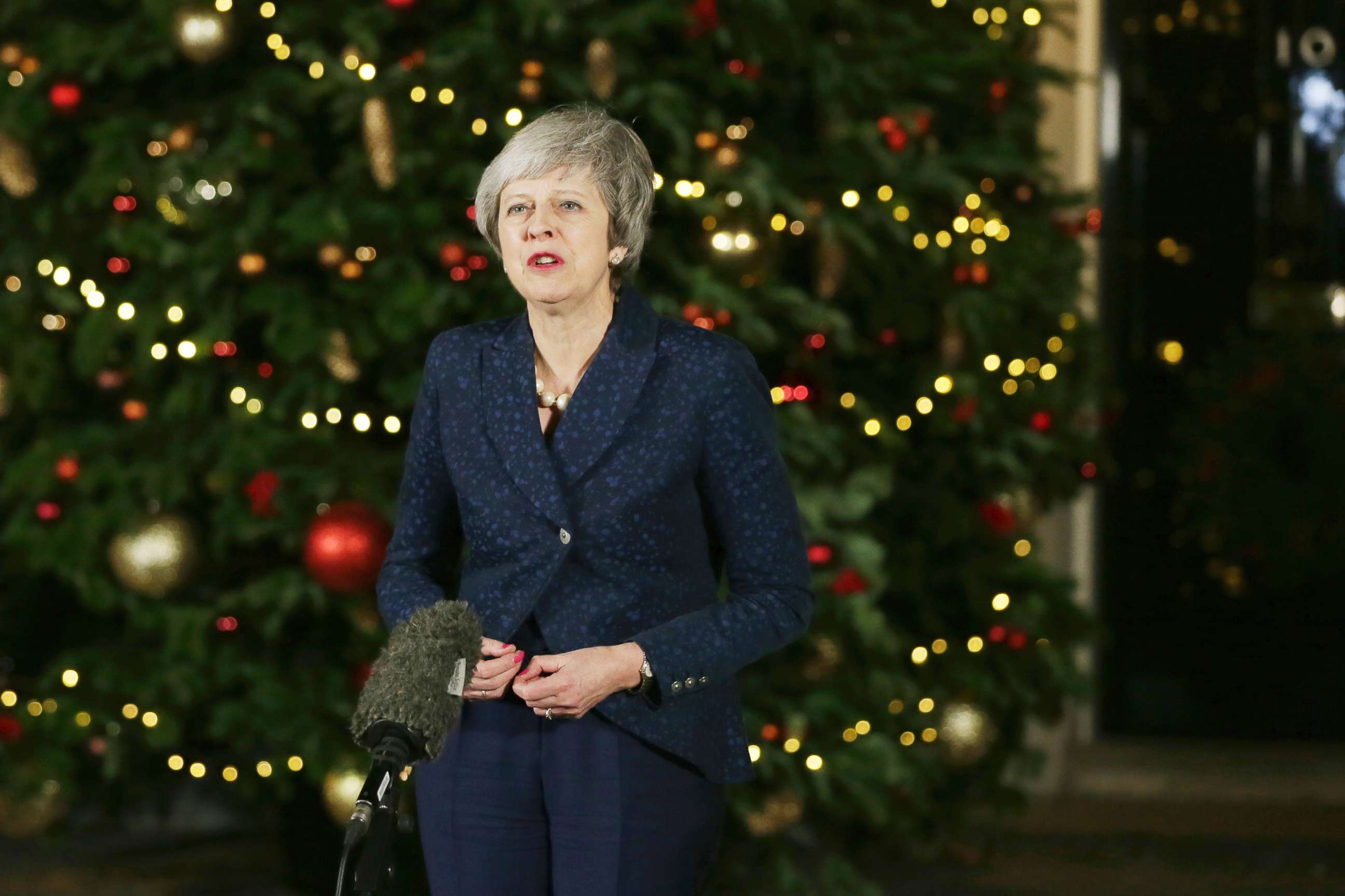 PHOTO: British Prime Minister Theresa May walks from 10 Downing Street to make a statement, in London, Wednesday Dec. 12, 2018.