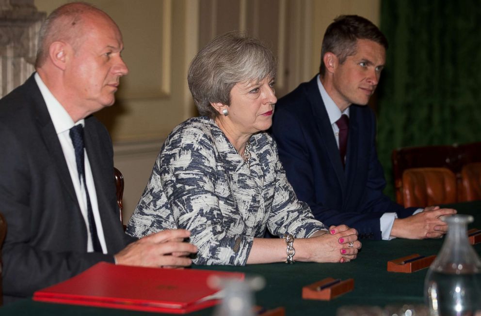 PHOTO: Pictured (L-R) are Britain's First Secretary of State Damian Green, Britain's Prime Minister Theresa May and Britain's Parliamentary Secretary to the Treasury, and Chief Whip, Gavin Williamson, in central London, June 26, 2017.
