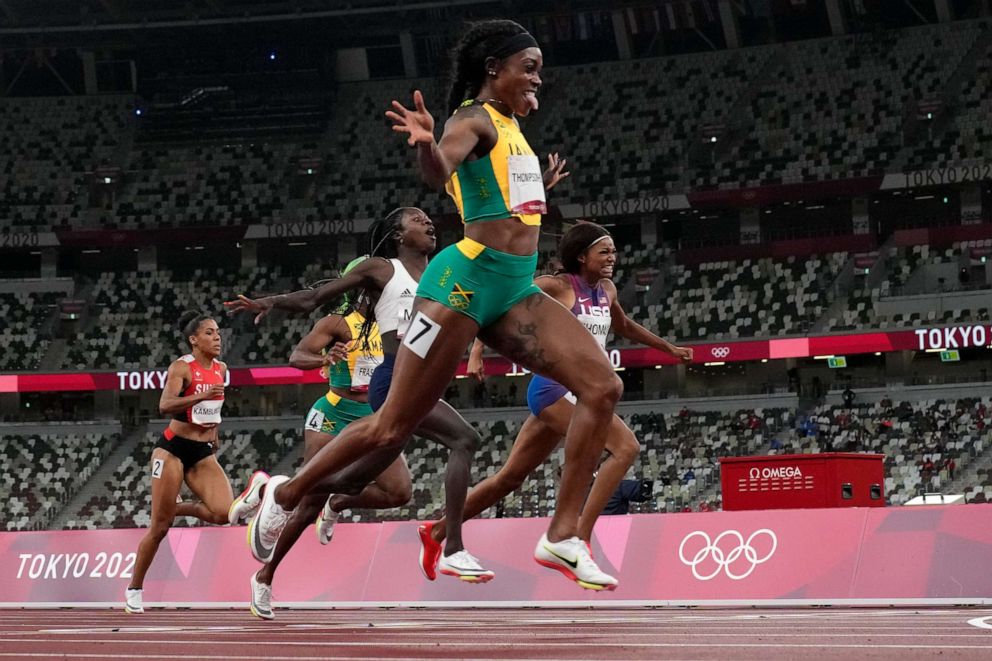 PHOTO: Elaine Thompson-Herah, of Jamaica, wins the final of the women's 200-meters at the 2020 Summer Olympics, Aug. 3, 2021, in Tokyo.
