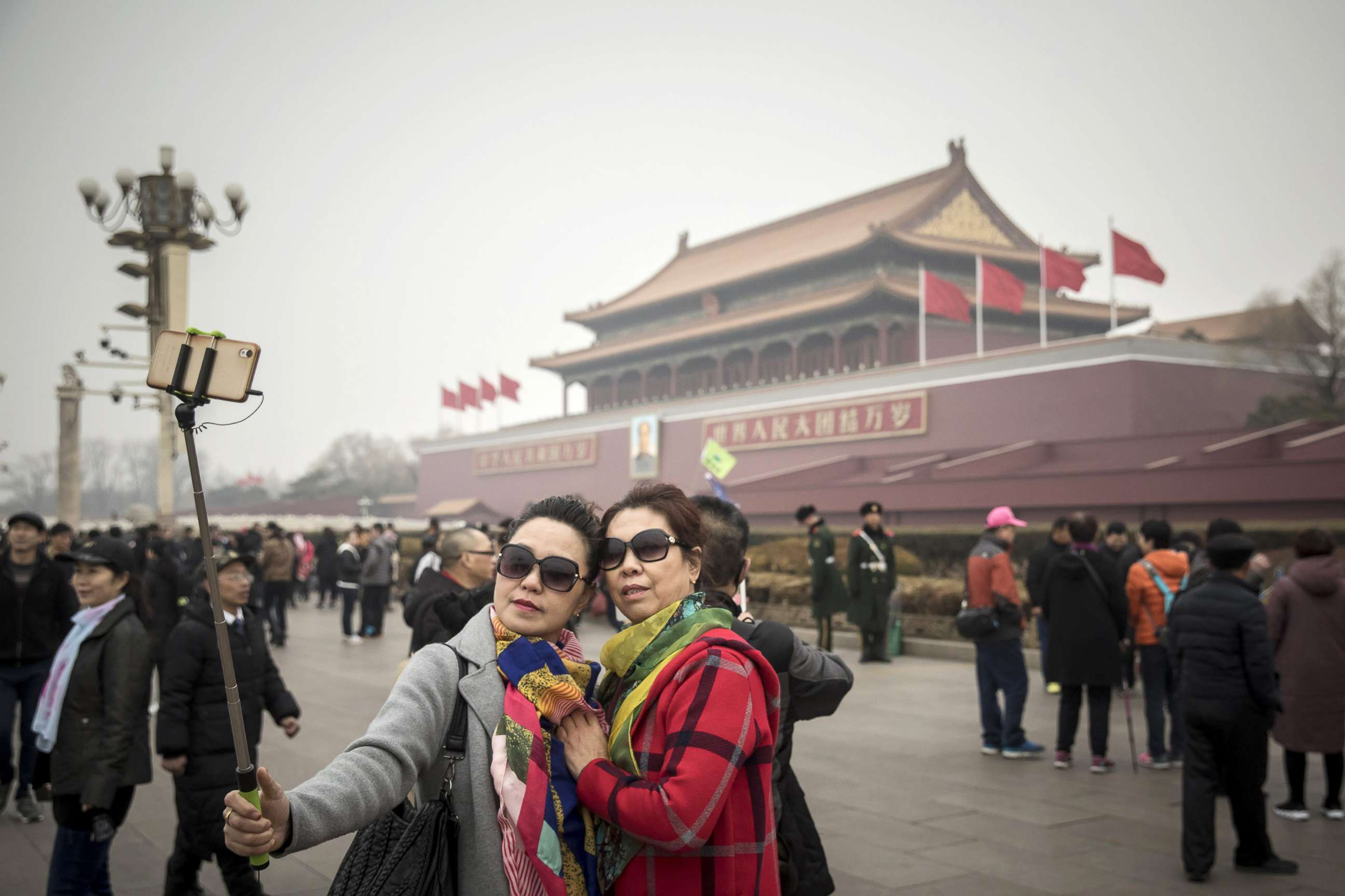 PHOTO: Tourists pose for a selfie photograph at Tiananmen Square in Beijing, China,  March 4, 2018.