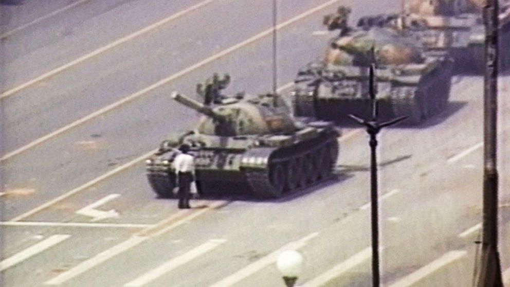 A lone demonstrator stands down a column of tanks, June 5, 1989, at the entrance to Tiananmen Square in Beijing. The incident took place on the morning after Chinese troops fired upon pro-democracy students who had been protesting in the square since April 15, 1989.