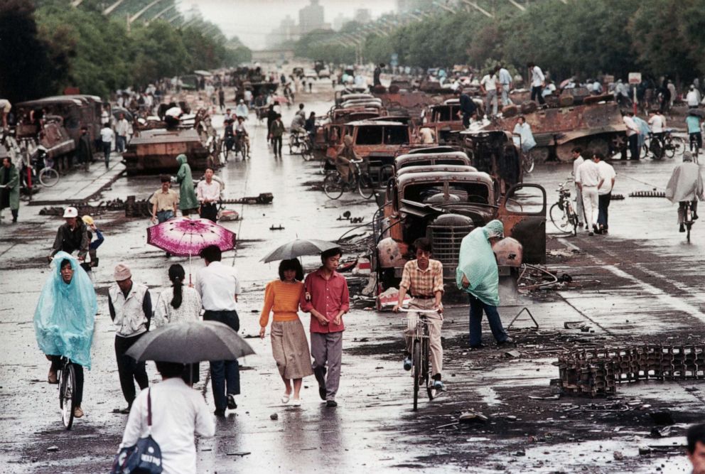 PHOTO: Pedestrians wander Chang'an Avenue the day after the PLA's brutal crackdown on student demonstrators in Tiananmen Square, June 2, 1989.