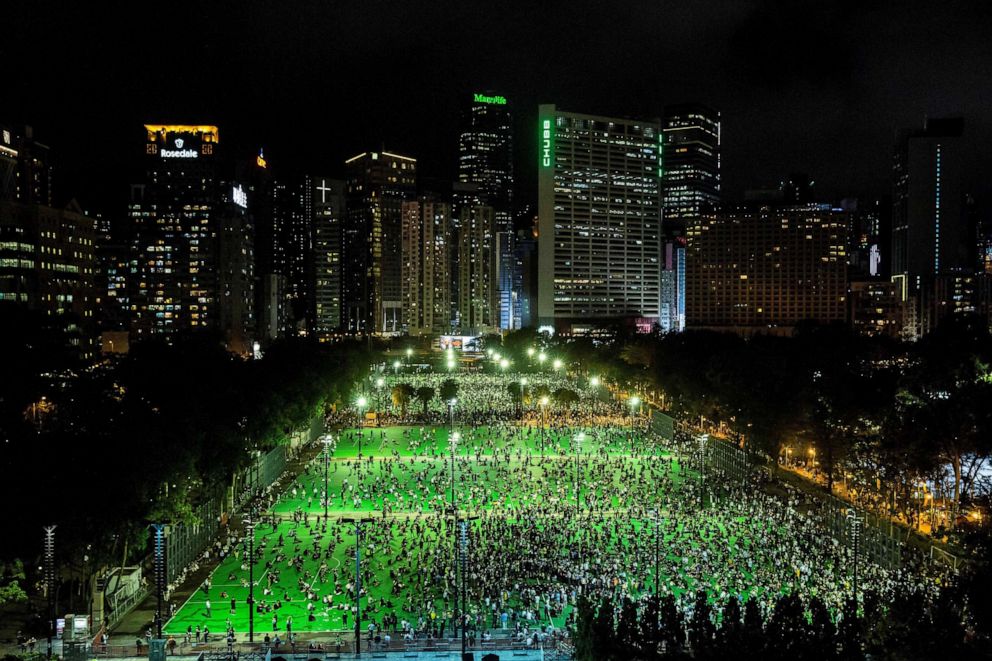 PHOTO: A candlelight vigil to commemorate the victims of the 1989 Tiananmen Square crackdown is held at Victoria Park in Hong Kong on June 4, 2020.