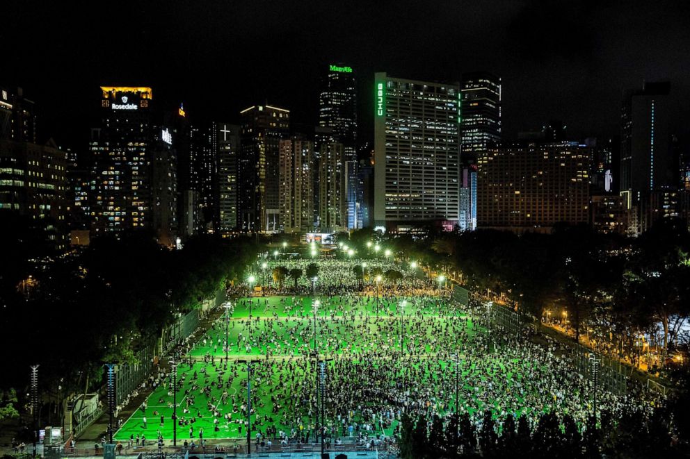 PHOTO: A candlelight vigil to commemorate the victims of the 1989 Tiananmen Square crackdown is held at Victoria Park in Hong Kong on June 4, 2020.