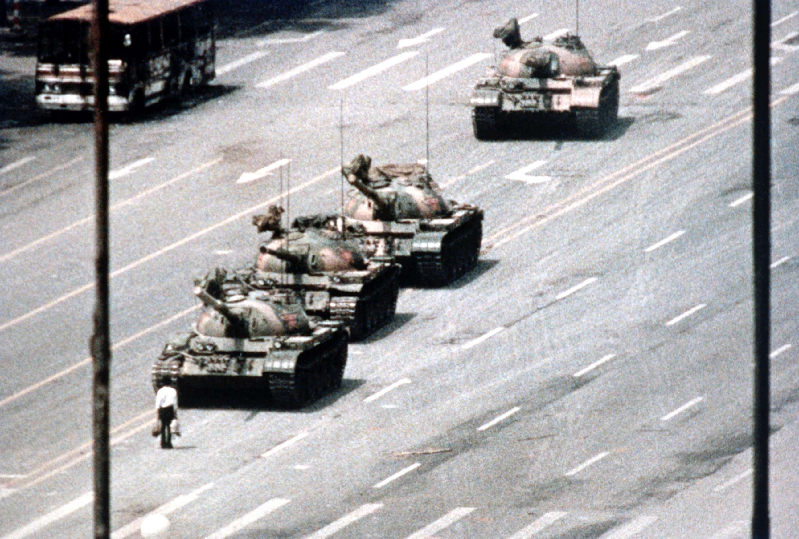 PHOTO: A Beijing demonstrator blocks the path of a tank convoy along the Avenue of Eternal Peace near Tiananmen Square, Beijing, on June 05, 1989.