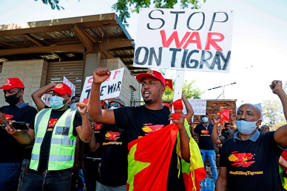 PHOTO: Ethiopians from the Tigray region holds placards while they gather and protest outside the Department of International Relations and Cooperation in Pretoria, South Africa, on Nov. 25, 2020.