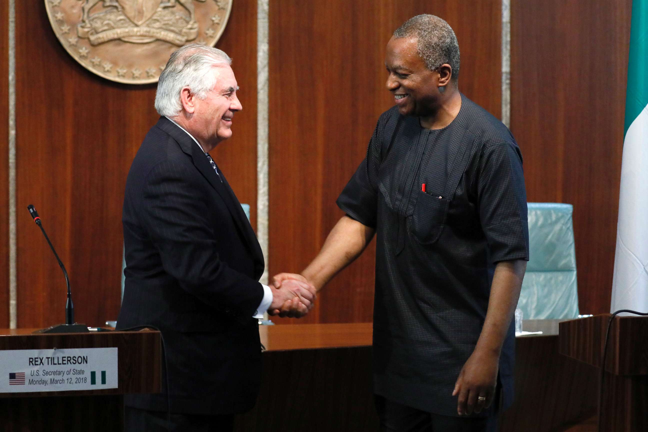 PHOTO: U.S. Secretary of State Rex Tillerson and Nigeria's Foreign Minister Geoffrey Onyeama shake hands after their news conference in Abuja, Nigeria, March 12, 2018. 