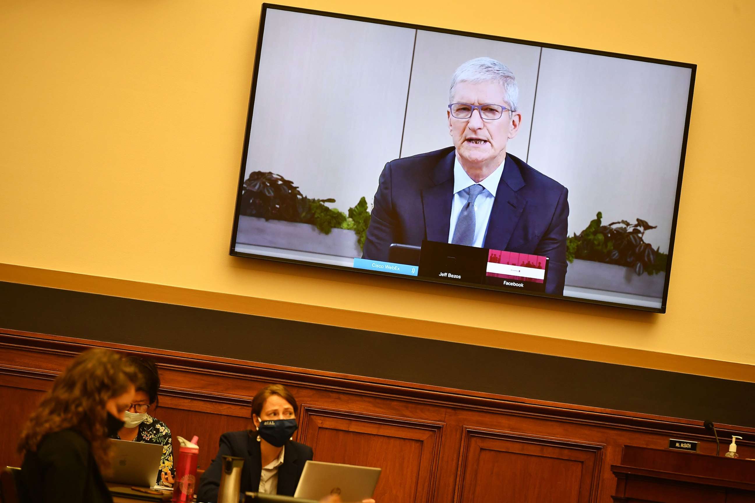 PHOTO: Apple CEO Tim Cook testifies before the House Judiciary Subcommittee on Antitrust, Commercial and Administrative Law on "Online Platforms and Market Power" in the Rayburn House office Building on Capitol Hill in Washington, DC on July 29, 2020.