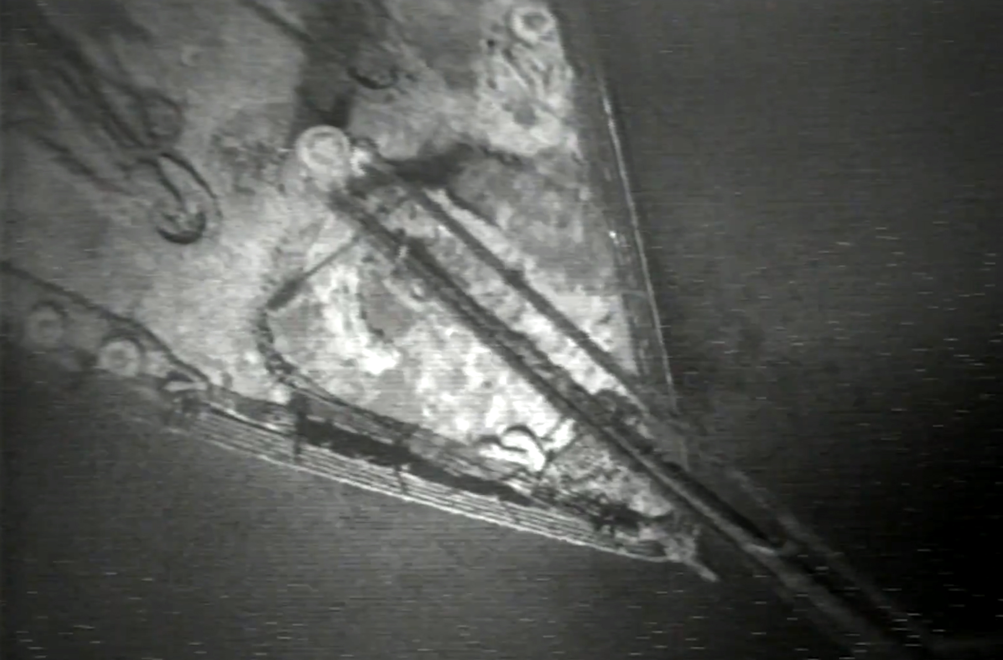 PHOTO: In this screen grab from a video released by the Woods Hole Oceanographic Institution, the Titanic is seen in rare footage.