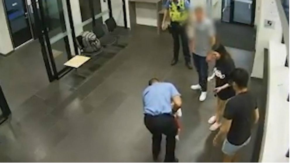 PHOTO: Surveillance footage captures a police sergeant in Perth, Australia, saving a chocking toddler in the lobby of his police station on Christmas Eve, Dec. 24, 2019. 