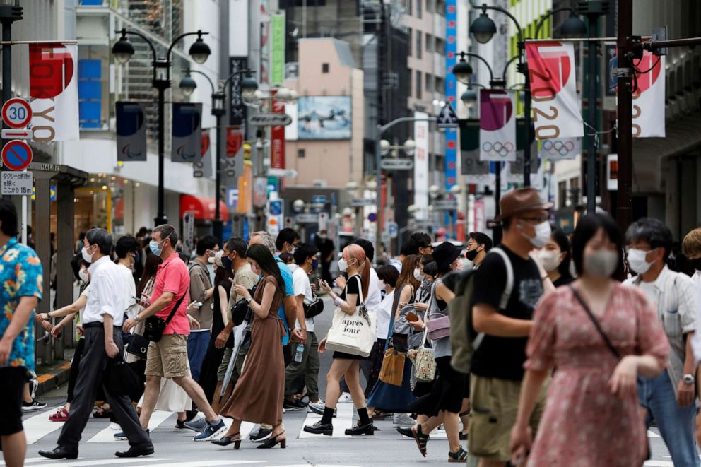 PHOTO: People walk at a crossing in Shibuya shopping area, amid the coronavirus disease (COVID-19) outbreak in Tokyo, Japan, Aug. 7, 2021.