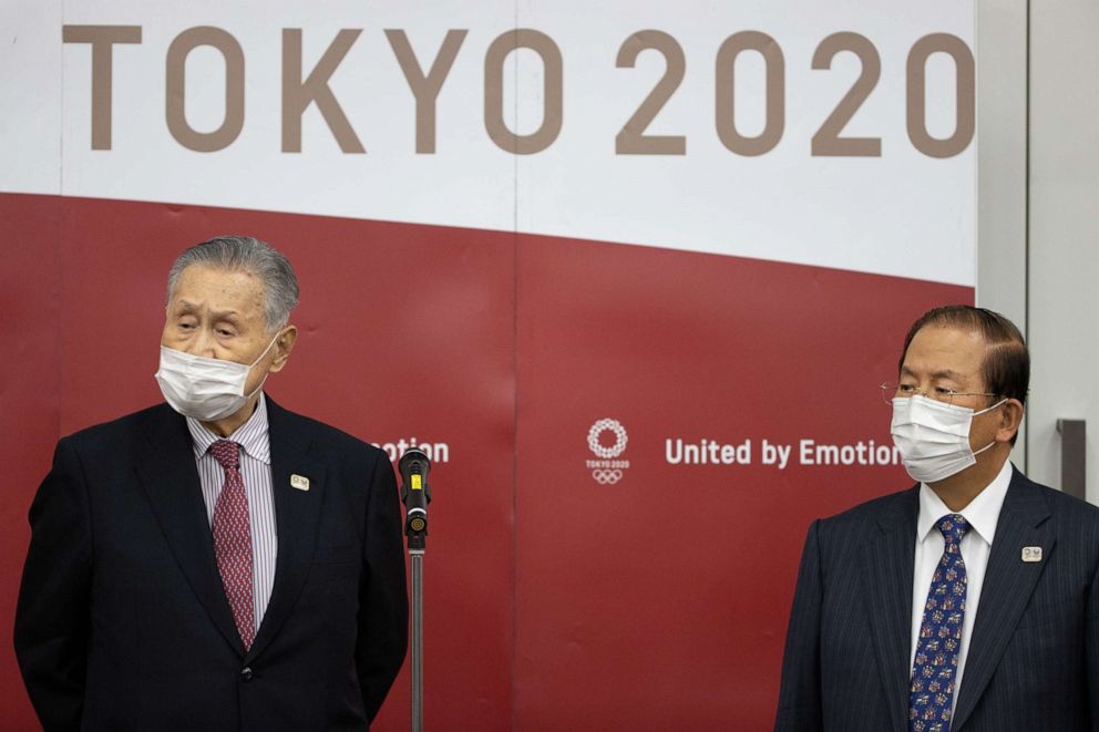 PHOTO: Tokyo 2020 President Yoshiro Mori, left, and Tokyo 2020 CEO Toshiro Muto speak to reporters at the Tokyo Olympic and Paralympic Games Organizing Committee headquarters in Tokyo, Japan, on Jan. 28, 2021.