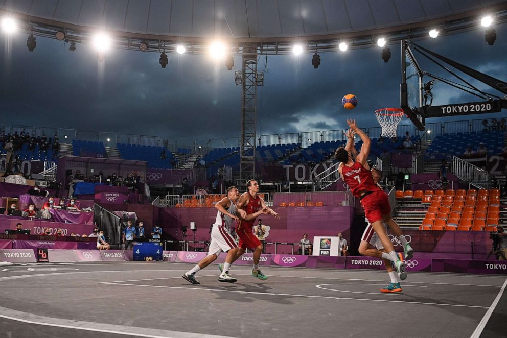 PHOTO: Belgium's Rafael Bogaerts jumps to score during the men's first round 3x3 basketball match between Latvia and Belgium at the Aomi Urban Sports Park in Tokyo, on July 24, 2021 during the Tokyo 2020 Olympic Games.