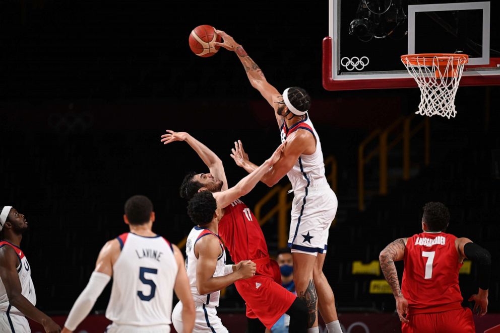 PHOTO: Javale McGee of Team United States blocks a shot by Navid Rezaeifar of Team Iran during a Men's Preliminary Round Group A game on day five of the Tokyo 2020 Olympic Games at Saitama Super Arena on July 28, 2021 in Saitama, Japan.