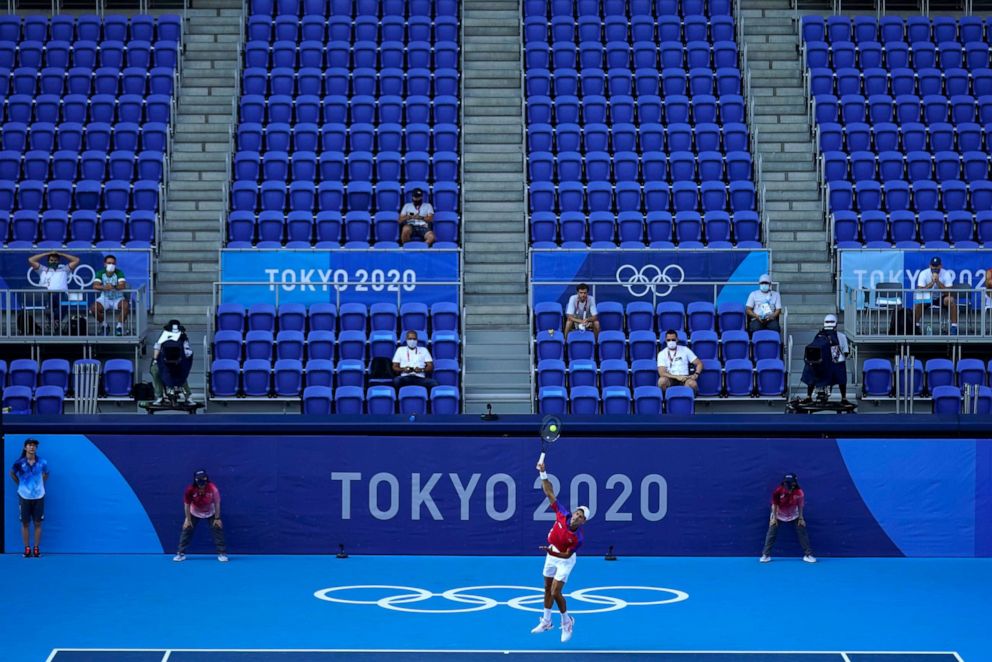PHOTO: Novak Djokovic, of Serbia, serves during the first round of the tennis competition at the 2020 Summer Olympics, Saturday, July 24, 2021, in Tokyo, Japan.