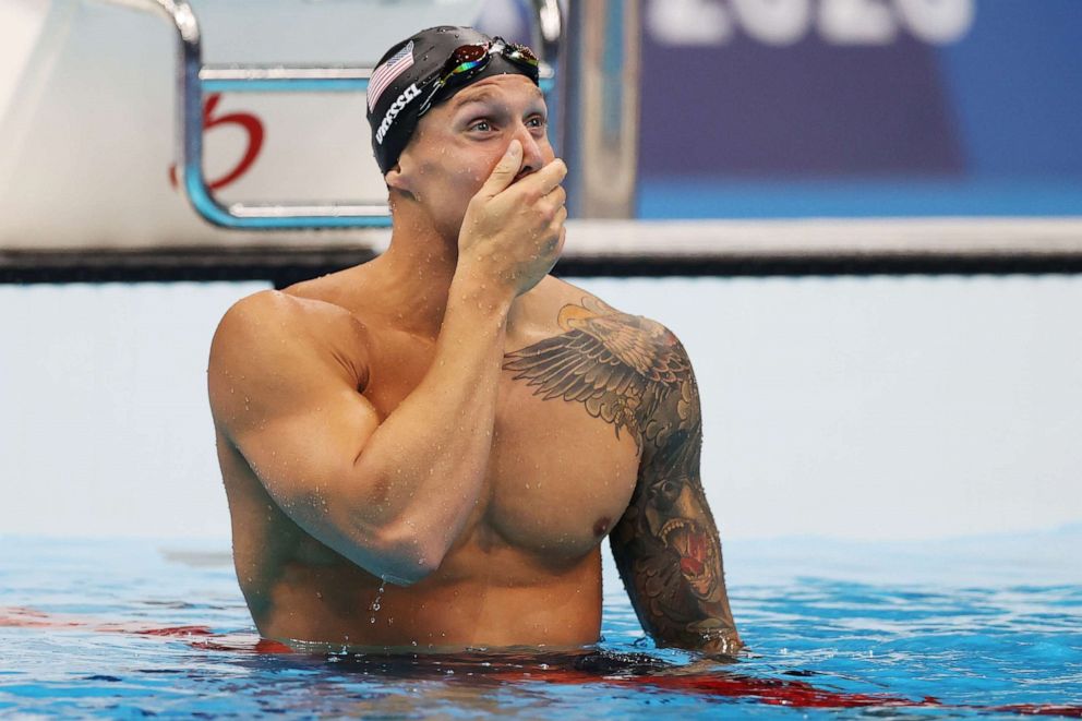 PHOTO: Caeleb Dressel of Team United States reacts after winning the gold medal in the Men's 100m Freestyle Final on day six of the Tokyo 2020 Olympic Games at Tokyo Aquatics Centre on July 29, 2021 in Tokyo, Japan.
