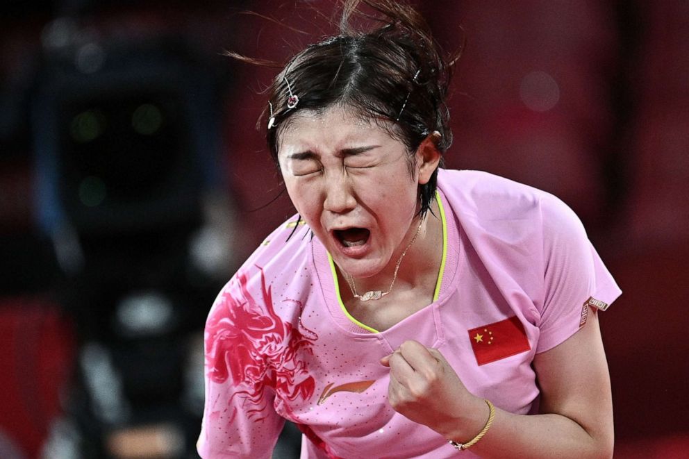 PHOTO: China's Chen Meng celebrates after defeating China's Sun Yingsha during the women's singles table tennis final match at the Tokyo Metropolitan Gymnasium during the Tokyo 2020 Olympic Games in Tokyo on July 29, 2021.