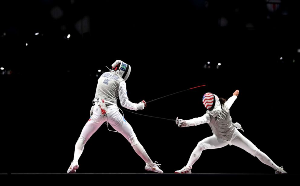 PHOTO: Inna Deriglazova of Team ROC, left, competes against Lee Kiefer of Team United States in the Women's Foil Individual Fencing Gold Medal Bout on day two of the Tokyo 2020 Olympic Games on July 25, 2021 in Chiba, Japan. 