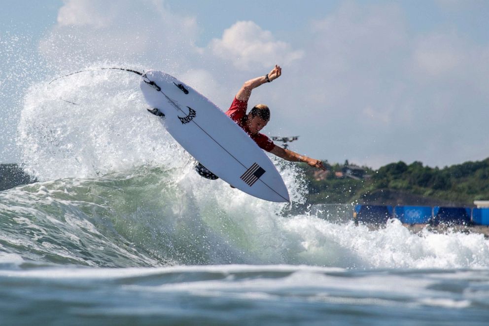 PHOTO: Kolohe Andino, of the United States, rides a wave during the first round of the men's surfing competition at the 2020 Summer Olympics, Sunday, July 25, 2021, at Tsurigasaki beach in Ichinomiya, Japan.