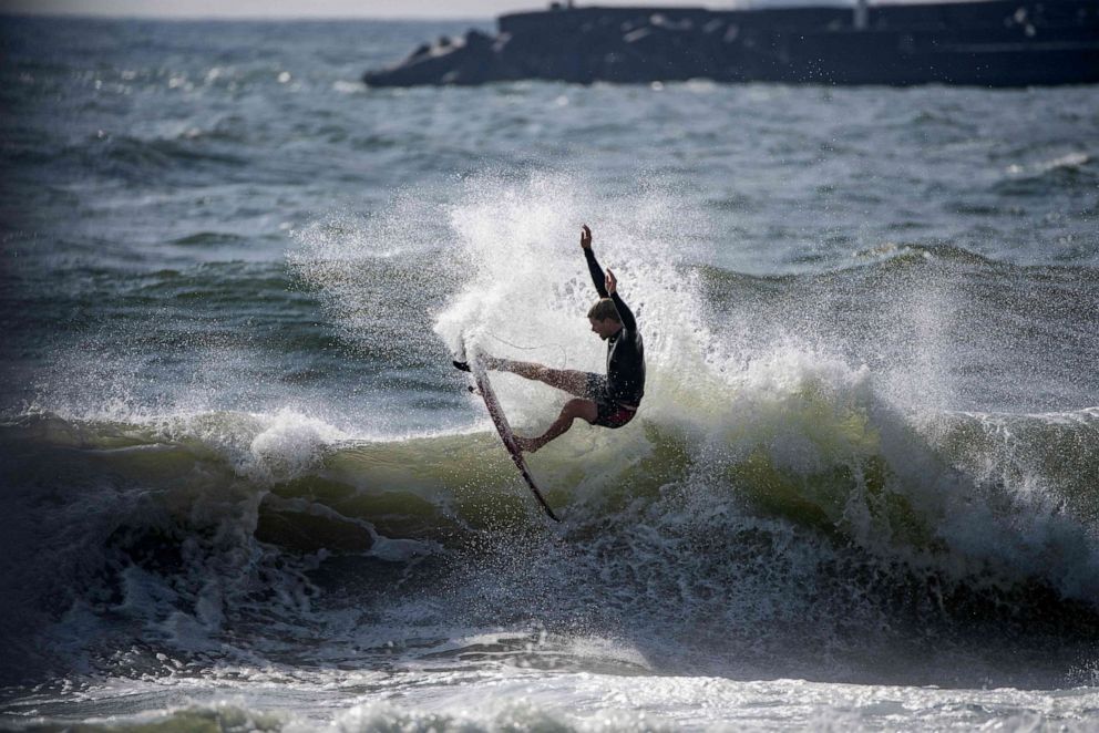 PHOTO: John John Florence of the United States rides a wave during a free session at the Tsurigasaki Surfing Beach, in Chiba, on July 26, 2021 during the Tokyo 2020 Olympic Games.