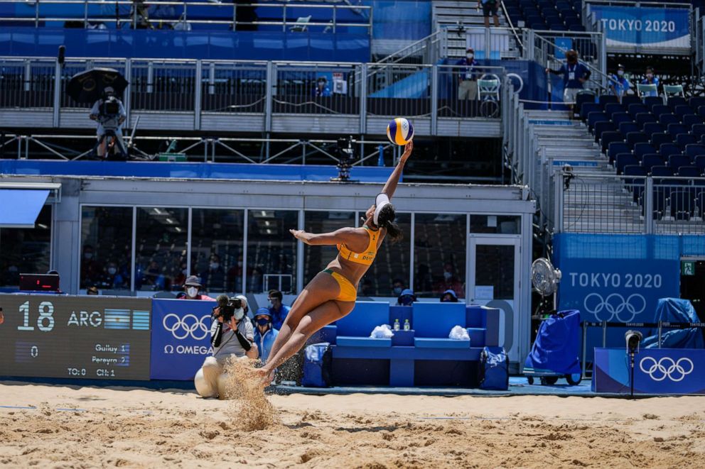 PHOTO: Eduarda Santos Lisboa, of Brazil, reaches for the ball during a women's beach volleyball match against Argentina at the 2020 Summer Olympics, Saturday, July 24, 2021, in Tokyo, Japan.