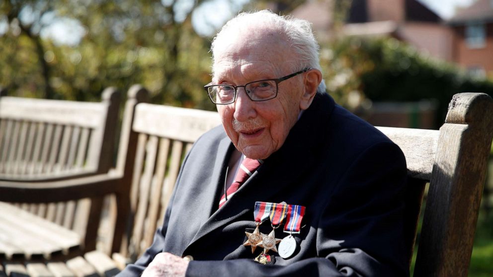 PHOTO: Retired British Army Captain Tom Moore, 99, raises money for health workers by attempting to walk the length of his garden one hundred times before his 100th birthday this month in Marston Moretaine, Britain, April 15, 2020.