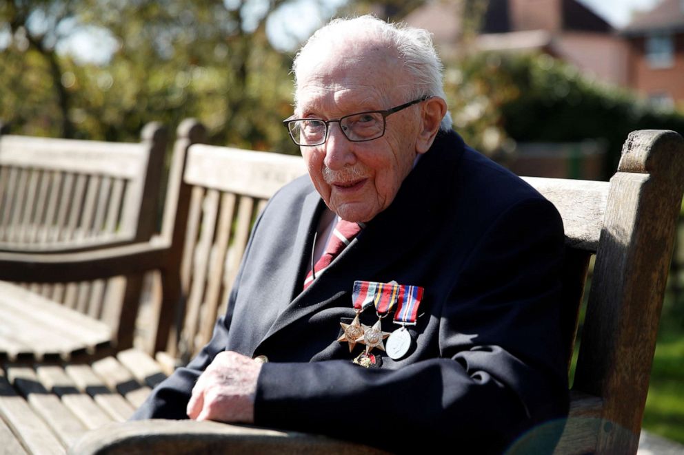 PHOTO: Retired British Army Captain Tom Moore, 99, poses as he continued to raise money for health workers, by attempting to walk the length of his garden one hundred times before his 100th birthday this month, Marston Moretaine, Britain, April 15, 2020.