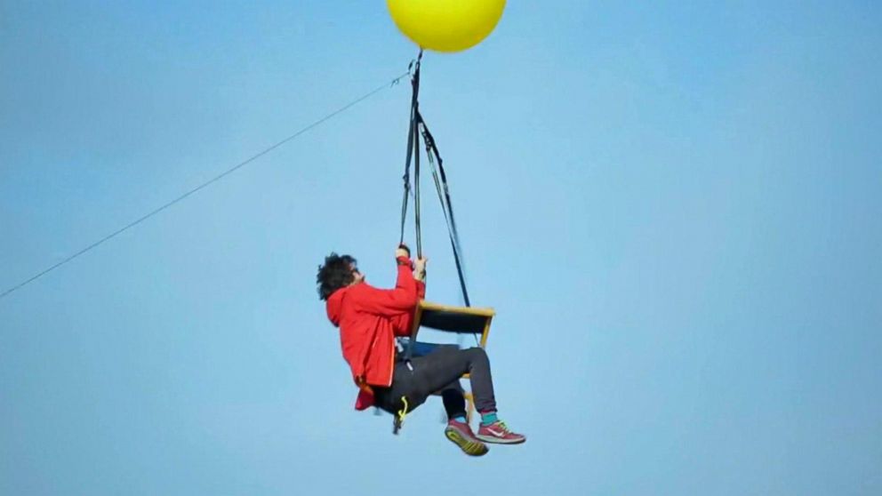 PHOTO: Tom Morgan, of Bristol, England, flew over South Africa attached to balloons in a stunt reminiscent of the animated movie "Up."