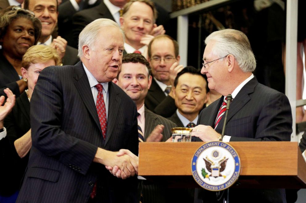 PHOTO: U.S. Secretary of State Rex Tillerson shakes hands with acting U.S. Secretary of State Tom Shannon while delivering remarks to Department of State employees upon arrival at the Department of State in Washington, Feb. 2, 2017. 