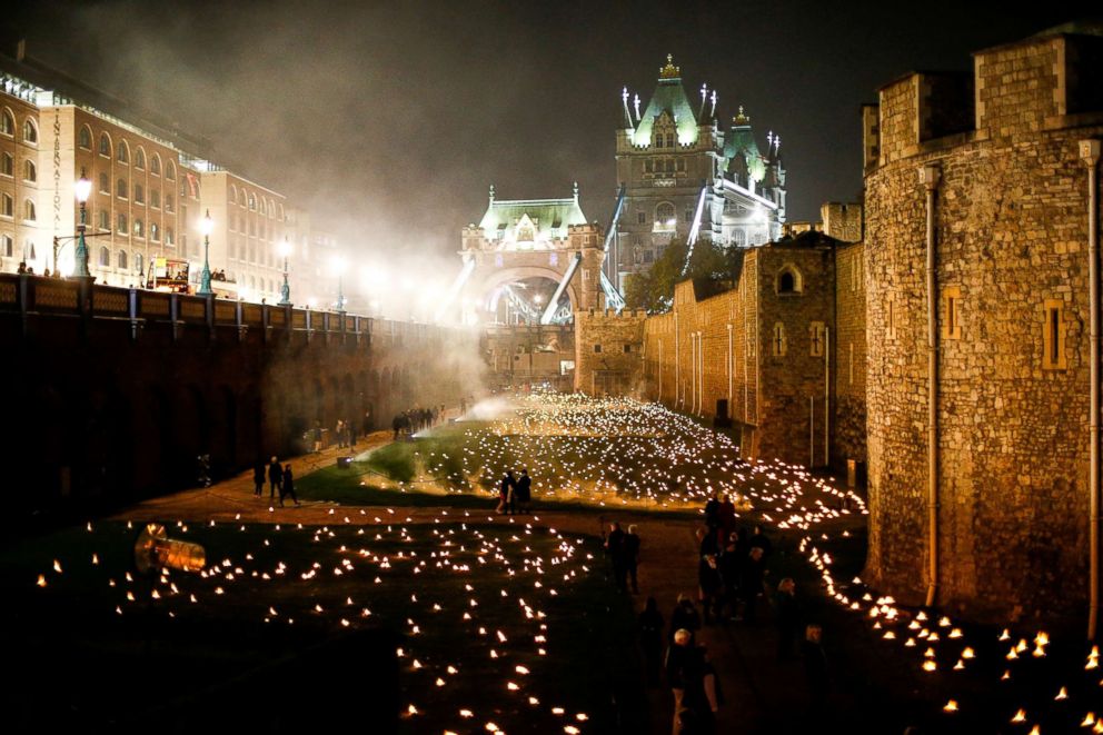 PHOTO: The moat of the Tower of London are seen filled with thousands of lit torches as part of the installation "Beyond the Deepening Shadow," in London, Nov. 4, 2018.