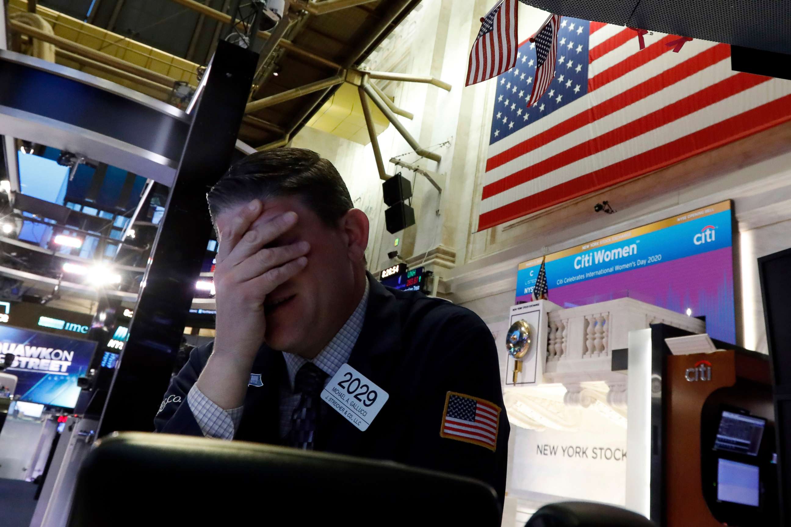 PHOTO: Trader Michael Gallucci prepares for the day's activity on the floor of the New York Stock Exchange, March 9, 2020.