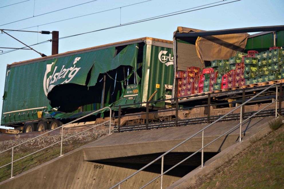 PHOTO: Damaged compartments of a cargo train near the Storebaelt bridge, near Nyborg in Denmark, Jan. 2, 2019.