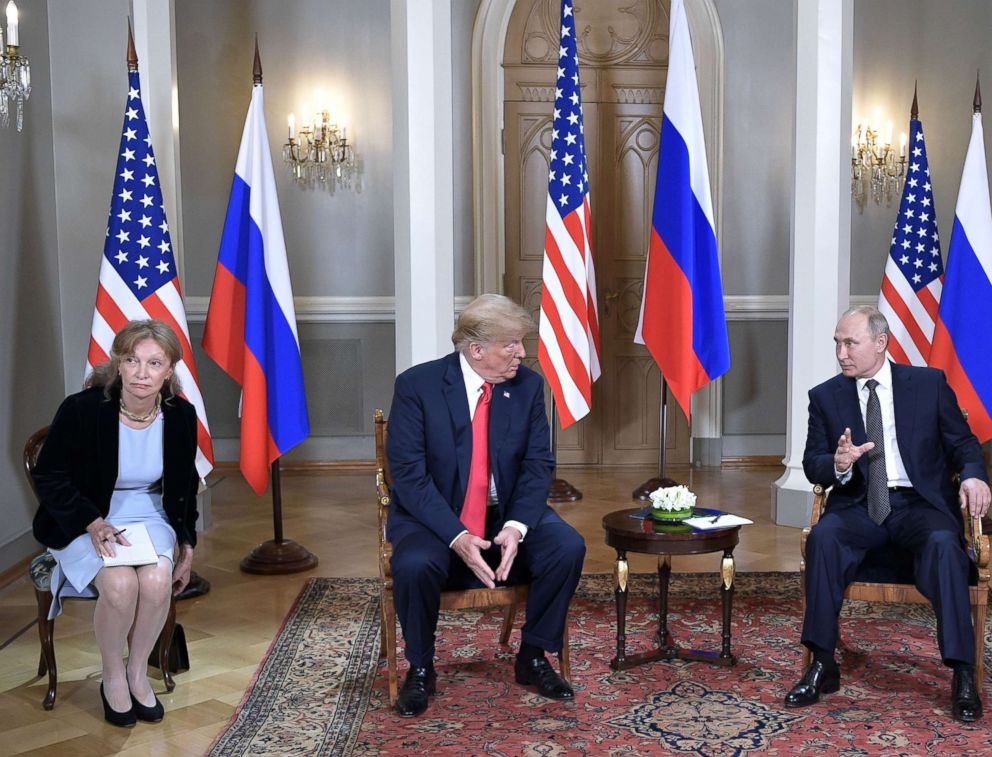 PHOTO: President Donald Trump meets with Russian President Vladimir Putin at the Presidential Palace in Helsinki, Finland, July 16, 2018. In picture at left is seen US interpreter Marina Gross.