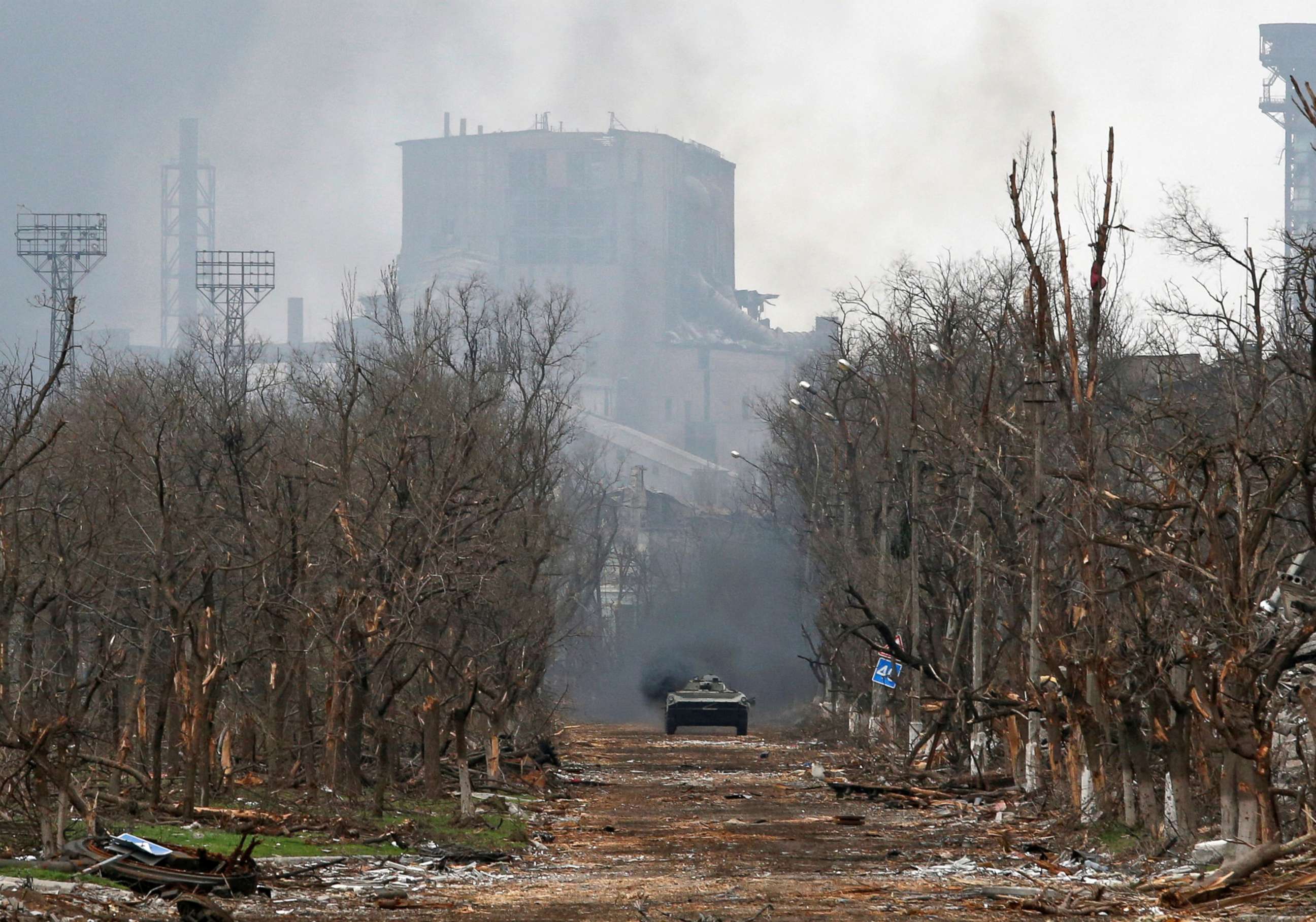 PHOTO: An armored vehicle of pro-Russian troops drives along a street during fighting near an iron and steel plant in the southern port city of Mariupol, Ukraine, April 12, 2022.