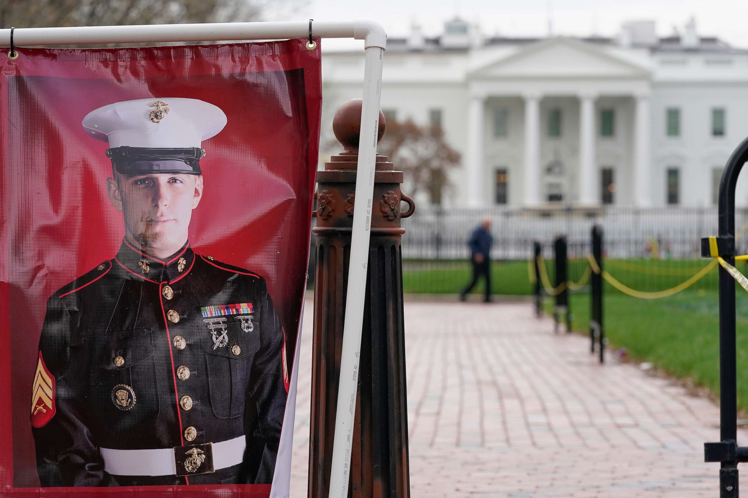 PHOTO: A poster photo of U.S. Marine Corps veteran and Russian prisoner Trevor Reed stands in Lafayette Park near the White House, March 30, 2022, in Washington. D.C.