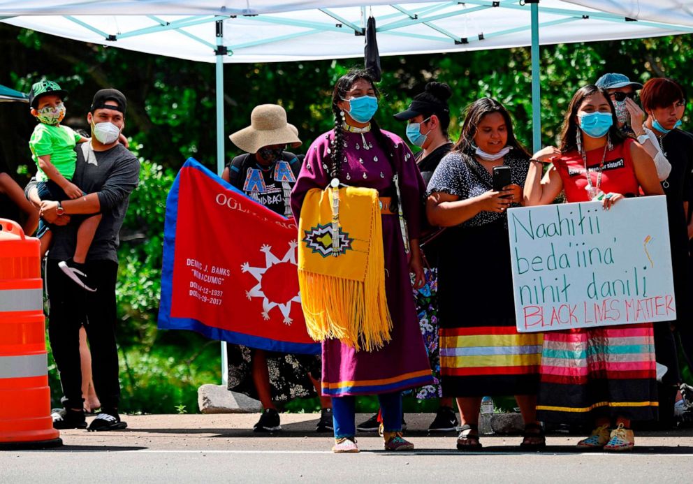 PHOTO: Activists and members of different Native American tribes from the region protest in Keystone, South Dakota on July 3, 2020, near Mount Rushmore ahead of the July 4th celebration with President Donald Trump.