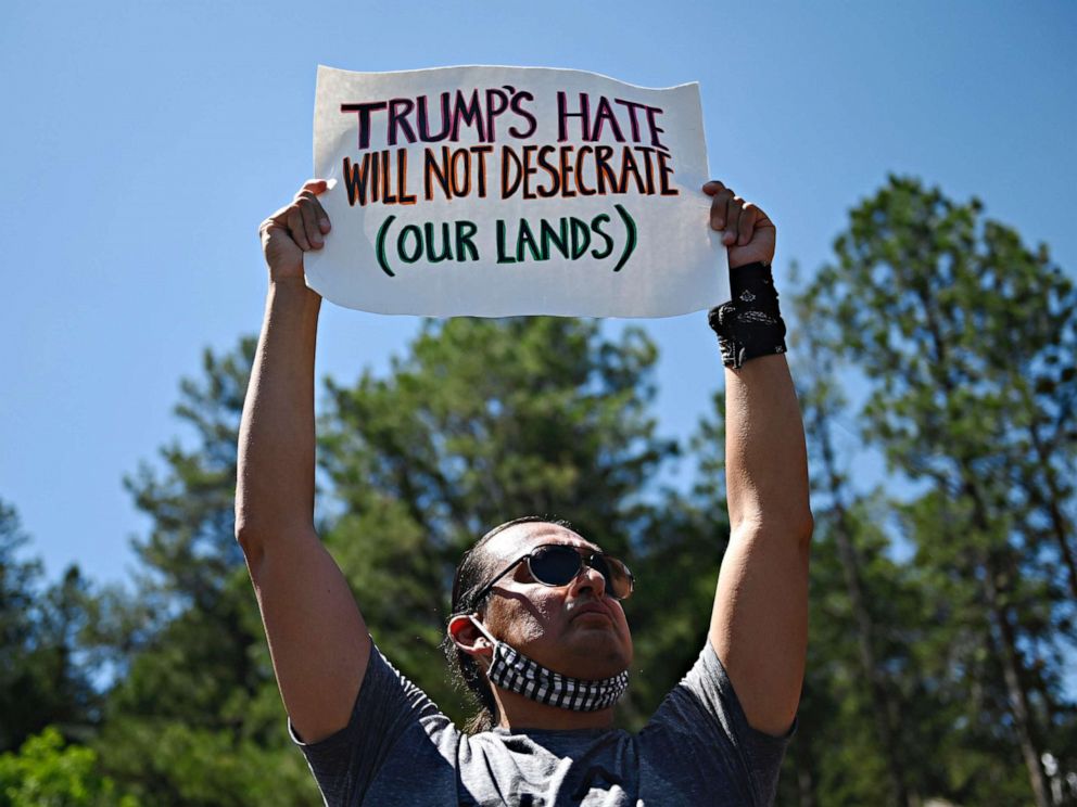 PHOTO: Activists and members of different Native American tribes from the region protest near the Mount Rushmore National Monument in Keystone, South Dakota, July 3, 2020.