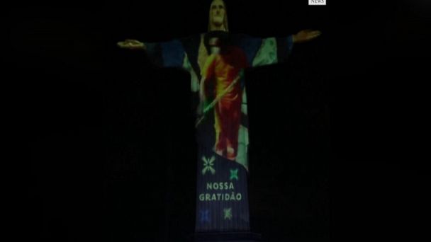 Video Rio S Christ The Redeemer Statue In Covid Victims Tribute Abc News