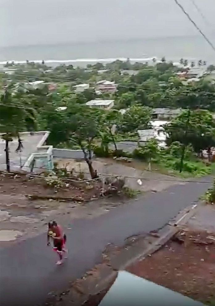 PHOTO: Tide churns and trees sway in the wind as residents hunker down during Tropical Storm Fiona in Recio, Patillas, Puerto Rico, Sept. 18, 2022. 