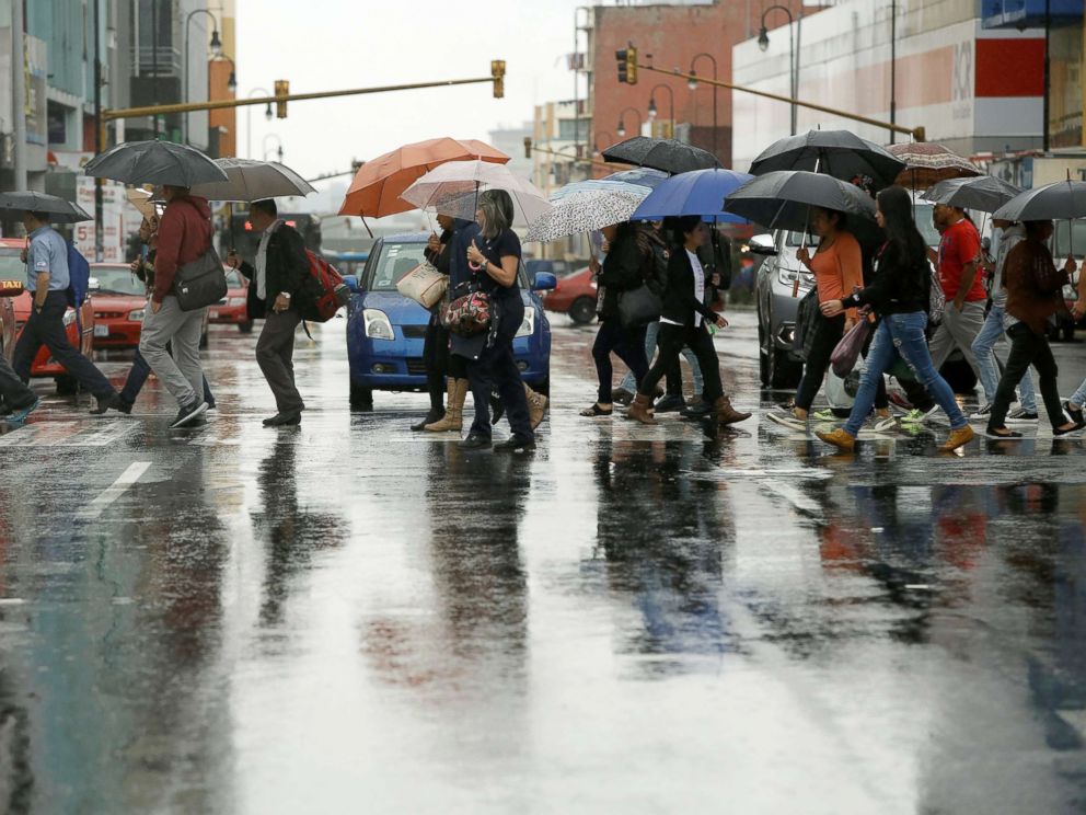 PHOTO: People walk on the main street of the city of San Jose, during heavy rains by Tropical Storm Nate, Costa Rica, Oct. 5, 2017.
