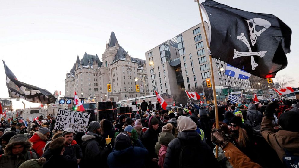 FILE PHOTO: Demonstrators have a dance party in the street outside the Rideau Centre in Ottawa, Ontario province, Canada, Feb. 5, 2022, as truckers and supporters continue to protest against COVID-19 vaccine mandates and pandemic-related restrictions.
