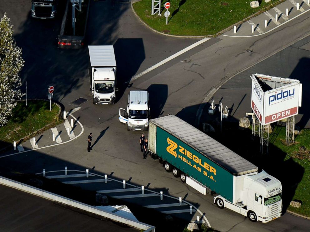 PHOTO: An aerial view shows French police officers searching a truck on Oct. 14, 2017, in Calais, France.