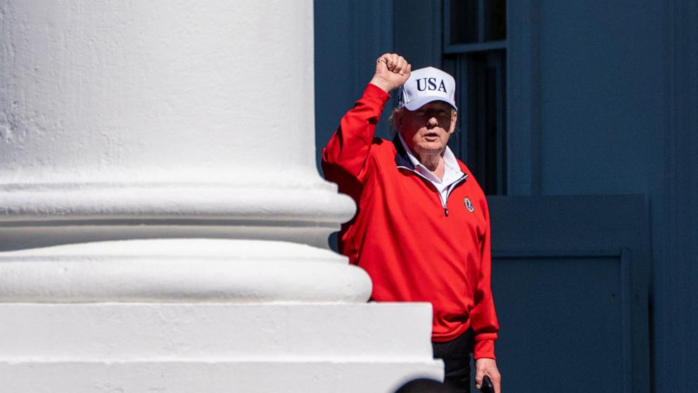 PHOTO: Donald Trump pumps his fist as he arrives at the White House, May 31, 2026, in Washington.