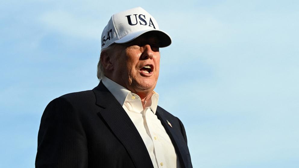 PHOTO: Donald Trump speaks to reporters after arriving on the South Lawn of the White House in Washington, DC, on May 15, 2026.