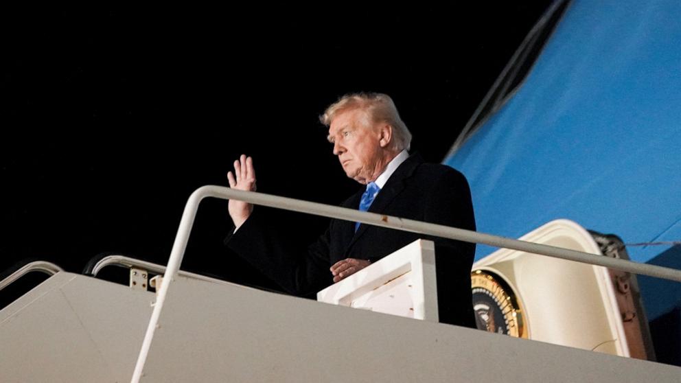 PHOTO: President Donald Trump gestures as he disembarks Air Force One at Fiumicino Airport, to attend the funeral of Pope Francis, near Rome, Italy, April 25, 2025. 
