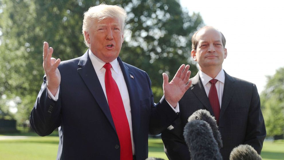 PHOTO: President Donald Trump speaks to members of the media with Secretary of Labor Alex Acosta on the South Lawn of the White House in Washington, July 12, 2019.