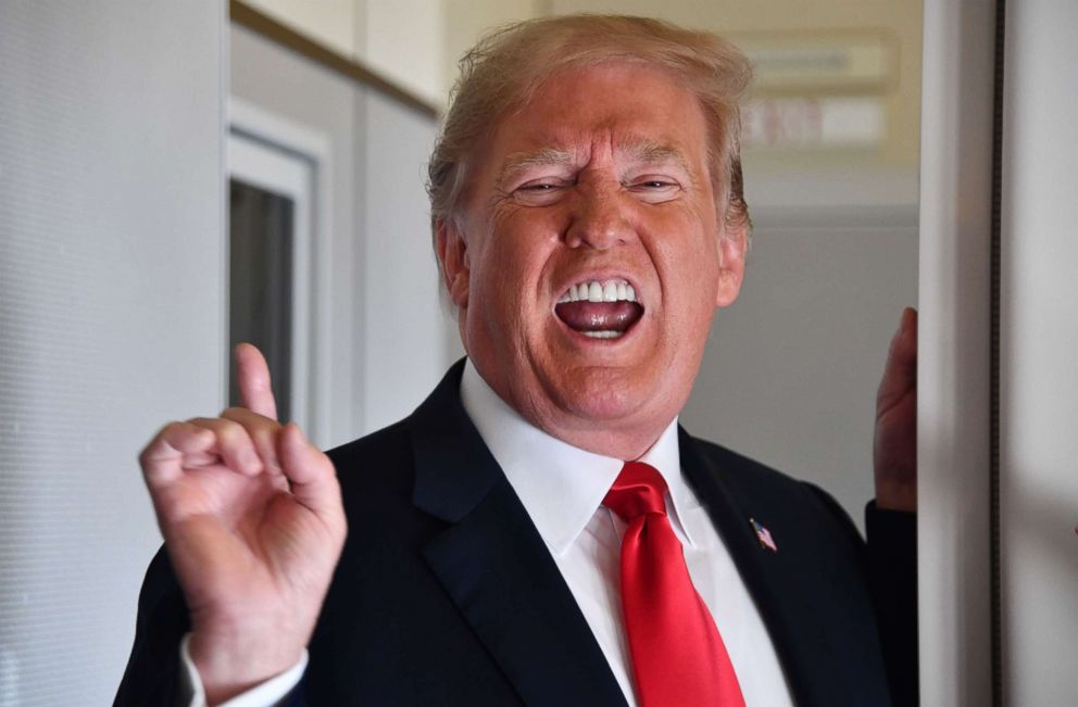 PHOTO: President Donald Trump speaks to the press aboard Air Force One, Sept. 7, 2018, as he travels to Fargo, N.D., to speak at a Joint Fundraising Committee. 